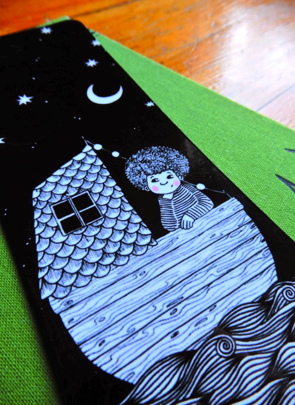 Girl in a boat bookmark